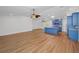 Open-concept kitchen featuring bright blue cabinets and a large central island at 2200 Horan S Way, Gulfport, FL 33707