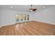 Bright and spacious living room with hardwood floors and French doors leading to the patio at 2200 Horan S Way, Gulfport, FL 33707