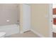 Bright bathroom showcasing a clean white bathtub, tile surround, and white paneled door at 2419 Richmond Greens Ct, Sun City Center, FL 33573