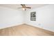 Bright bedroom featuring a ceiling fan and window bringing in natural light at 2925 Starmount Dr, Valrico, FL 33596