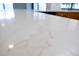 Close up on the white countertops in the kitchen, with natural veining detail at 2925 Starmount Dr, Valrico, FL 33596