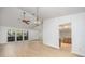Living room featuring a vaulted ceiling, lots of light and bright open access to other rooms at 2925 Starmount Dr, Valrico, FL 33596