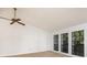 Bright living room with three large windows offering plenty of natural light at 2925 Starmount Dr, Valrico, FL 33596