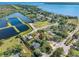 An aerial view showing the property's location near a body of water at 303 National Orange Ave, Oldsmar, FL 34677