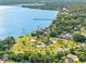 An aerial view of the community highlighting its coastal setting at 303 National Orange Ave, Oldsmar, FL 34677