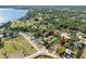 Aerial view showcasing the home's proximity to waterways, parks, and green spaces at 303 National Orange Ave, Oldsmar, FL 34677