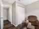 Bedroom featuring a closet, carpeted floor, and upholstered chair at 303 National Orange Ave, Oldsmar, FL 34677
