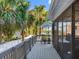 Enjoy the view from this home's large screened porch with table, chairs and view of the water at 303 National Orange Ave, Oldsmar, FL 34677
