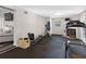 Spacious workout room equipped with fitness equipment and a cozy ambiance for convenient exercise sessions at 303 National Orange Ave, Oldsmar, FL 34677