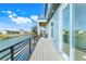 Spacious outdoor balcony overlooking waterfront views features deck chairs at 3496 Amberjack Dr, Hernando Beach, FL 34607