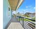 Beautiful balcony with metal railings and view of neighborhood at 3496 Amberjack Dr, Hernando Beach, FL 34607