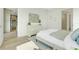 Bright bedroom with an ensuite bathroom and views into the kitchen at 3496 Amberjack Dr, Hernando Beach, FL 34607