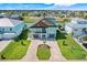 Beautiful two-story home with a two-car garage, balcony, and scenic waterfront views at 3496 Amberjack Dr, Hernando Beach, FL 34607