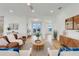 Bright and airy living room with hardwood floors, contemporary furniture, and an open layout with lots of natural light at 3496 Amberjack Dr, Hernando Beach, FL 34607