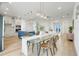 Open living space featuring a kitchen, dining area, and living room with plenty of natural light at 3496 Amberjack Dr, Hernando Beach, FL 34607