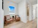 Cozy sitting area featuring comfortable seating, natural light, and access to an adjacent room at 3496 Amberjack Dr, Hernando Beach, FL 34607