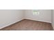 Cozy bedroom featuring carpet floors and a window that provides ample light at 37214 Sagemoor Dr, Zephyrhills, FL 33541