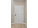 Clean white front door with six panels at 37214 Sagemoor Dr, Zephyrhills, FL 33541