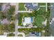 From above, this home boasts a pristine pool, verdant landscaping, and convenient access to waterfront activities at 424 Island Cay Way, Apollo Beach, FL 33572