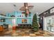 Spacious living room with vaulted ceilings, tile flooring, and lots of natural light at 424 Island Cay Way, Apollo Beach, FL 33572