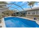 Enjoy the enclosed pool area with access to the home's interior, designed for both relaxation and entertainment at 424 Island Cay Way, Apollo Beach, FL 33572