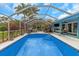 Inviting enclosed pool area offering a perfect spot for relaxation and fun in a private backyard setting at 424 Island Cay Way, Apollo Beach, FL 33572