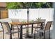 Backyard patio featuring dining furniture and ample space for outdoor living at 439 E Boyer St, Tarpon Springs, FL 34689