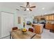 Bright kitchen featuring stainless steel appliances, a center island, and an open layout to the dining area at 439 E Boyer St, Tarpon Springs, FL 34689