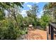 This property has a beautiful backyard overlooking lush greenery and a river at 4701 Rambling River Rd, Brandon, FL 33511
