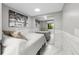 Calm bedroom with a mirrored closet, light walls, and a comfortable bed at 4701 Rambling River Rd, Brandon, FL 33511