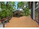 Spacious wooden deck with gazebo, perfect for outdoor gatherings and relaxation at 4701 Rambling River Rd, Brandon, FL 33511