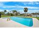 Refreshing pool with a sculpture, ideal for cooling off and adding a touch of elegance to the backyard at 5201 Dover Ne St, St Petersburg, FL 33703