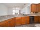 Kitchen showcasing granite countertops, stainless steel appliances, and breakfast bar at 5331 Villagebrook Dr, Wesley Chapel, FL 33544