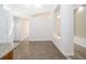 Open layout features wood and tile floors with lots of natural light at 5331 Villagebrook Dr, Wesley Chapel, FL 33544