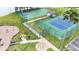 Aerial view of community sports courts with a basketball court, tennis court, and playground at 5331 Villagebrook Dr, Wesley Chapel, FL 33544