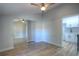 Bright bedroom leads into kitchen space and features large closet at 610 N Woodlynne Ave, Tampa, FL 33609