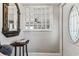 Well-lit foyer with decorative wall cut-out and view through to the living room at 610 N Woodlynne Ave, Tampa, FL 33609