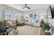Inviting living room showcasing neutral colors, natural light, and contemporary furnishings at 610 N Woodlynne Ave, Tampa, FL 33609