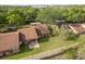 Aerial view of backyard featuring a patio, lawn, and fence at 7501 Greystone Dr, Hudson, FL 34667