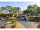 Landscaped community with well-maintained homes and convenient parking at 7501 Greystone Dr, Hudson, FL 34667