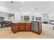 Kitchen featuring a wood island with marble countertops, stainless steel appliances, and plenty of cabinet space at 1003 Berkshire Ln, Tarpon Springs, FL 34688