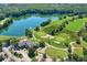 Stunning aerial view of the golf course and lake, showcasing the community's natural beauty at 10339 Lightner Bridge Dr, Tampa, FL 33626