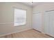 This bedroom offers neutral walls and baseboard with new wood flooring at 10339 Lightner Bridge Dr, Tampa, FL 33626