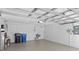 Spacious two-car garage with ample storage, utility sink and epoxy flooring at 10339 Lightner Bridge Dr, Tampa, FL 33626