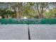 Close-up of the Westchase street sign set amongst a background of trees at 10339 Lightner Bridge Dr, Tampa, FL 33626