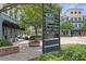 West Park Village Town Center signage surrounded by local shops and lush landscaping at 10339 Lightner Bridge Dr, Tampa, FL 33626