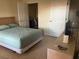 Cozy bedroom with a comfortable bed, closet and ample natural light at 10764 70Th Ave # 4302, Seminole, FL 33772