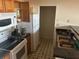 Functional kitchen equipped with essential appliances including stove, microwave, and refrigerator at 10764 70Th Ave # 4302, Seminole, FL 33772