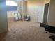 Spacious living room featuring carpet flooring and natural light from a large window at 10764 70Th Ave # 4302, Seminole, FL 33772