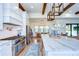 Gourmet kitchen features stainless steel appliances, subway tile backsplash, and an open concept at 111 Alafia Estates Ln, Plant City, FL 33567
